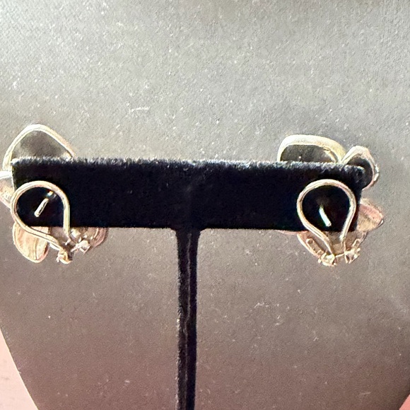 Angela Cummings ‘s earrings , Elegant Silver Flower....
